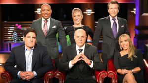 Shark Tank cast group photo with MARK CUBAN, DAYMOND JOHN, BARBARA CORCORAN, KEVIN O'LEARY, ROBERT HERJAVEC, LORI GREINER