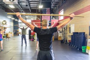 NW Crossfit trainer leading a stretch routine