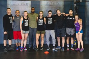 NWCrossfit class taking a group picture together