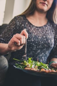 Woman about to eat salad