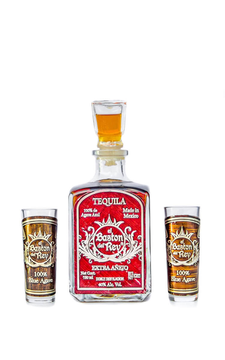Baston de Rey red-labeled tequila bottle with tequila shot glasses