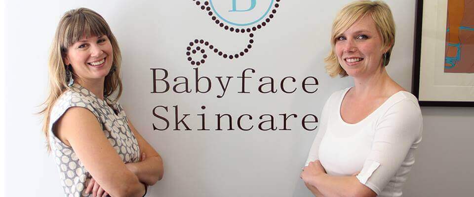 Two women smiling at babyface skincare salon